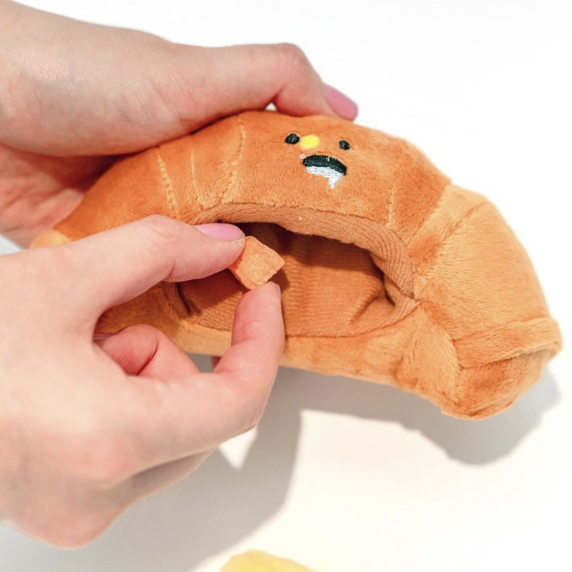 Croissant interactive toy